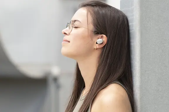 Headphones in the ear.