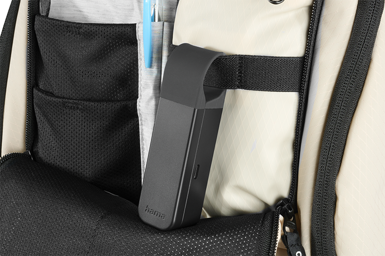 The robust charging box is attached to the rucksack with a loop