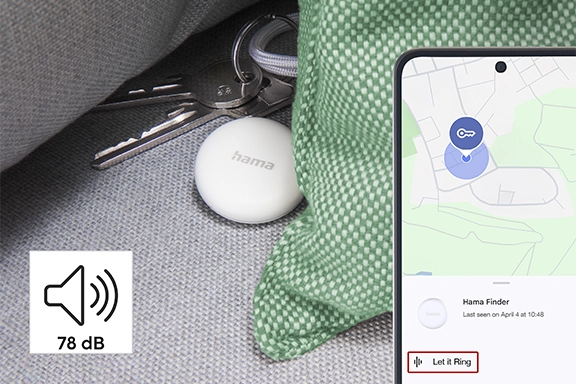 The key finder is hidden behind sofa cushions and can be found quickly with the app
