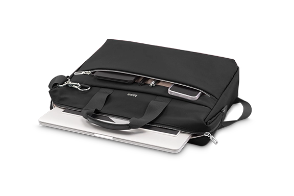Cropped image of the ‘Ultimate’ laptop bag lying on its side. A notebook is sticking out of the open compartment