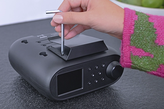 A flush-mounted radio is installed without drilling.