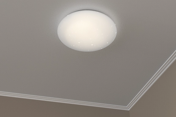 The Hama WLAN LED ceiling light "Glitter", voice / app control, dimmable, Ø 30 cm is mounted on a ceiling