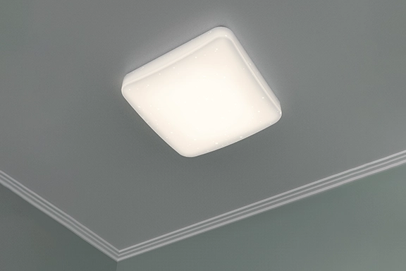 The Hama WLAN LED ceiling light "Glitter", voice / app control, dimmable, 27 x 27 cm is mounted on a ceiling